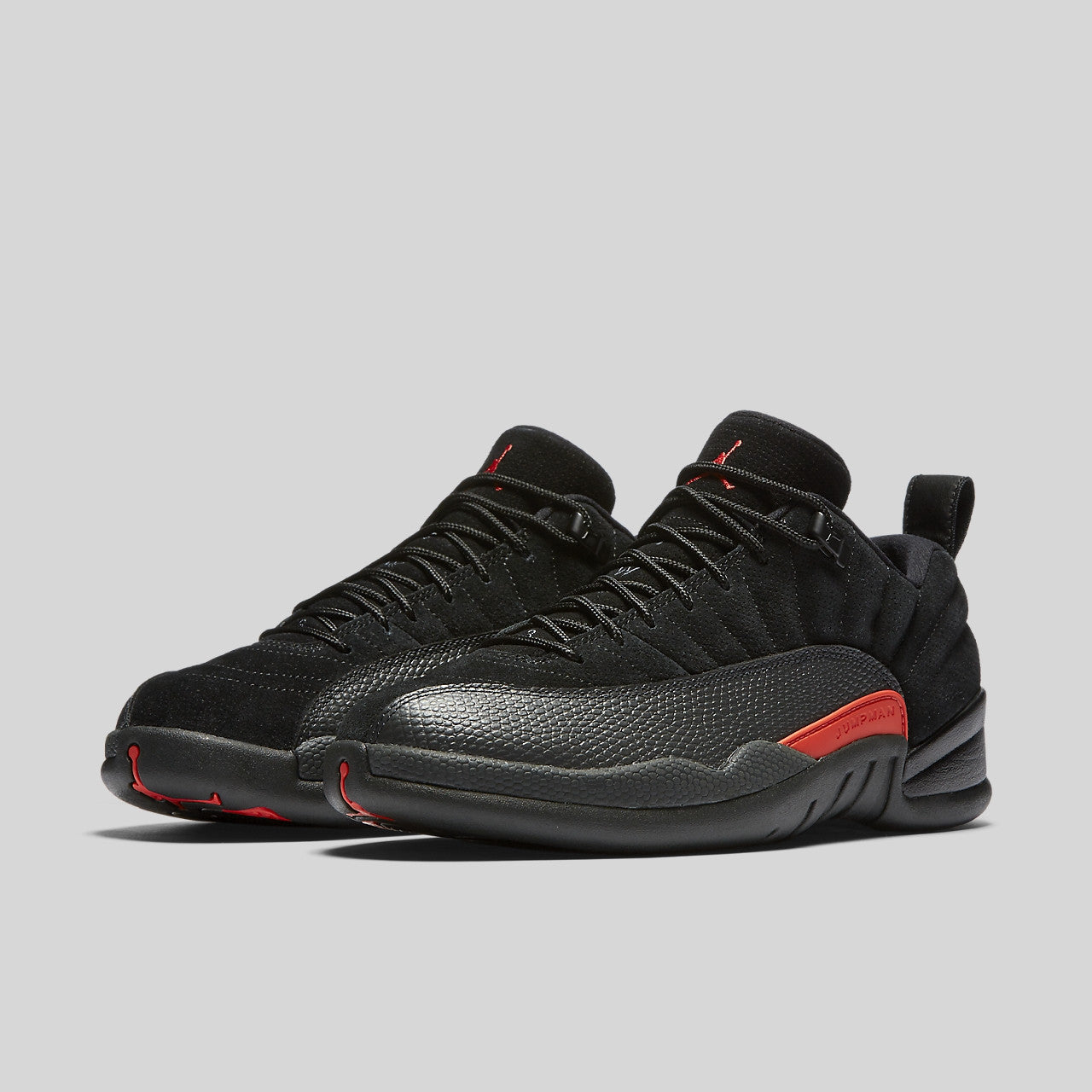 black and orange jordan 12 low