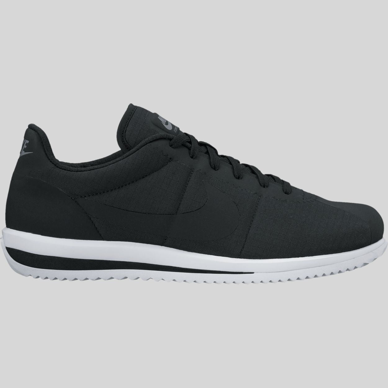 nike cortez gray and black