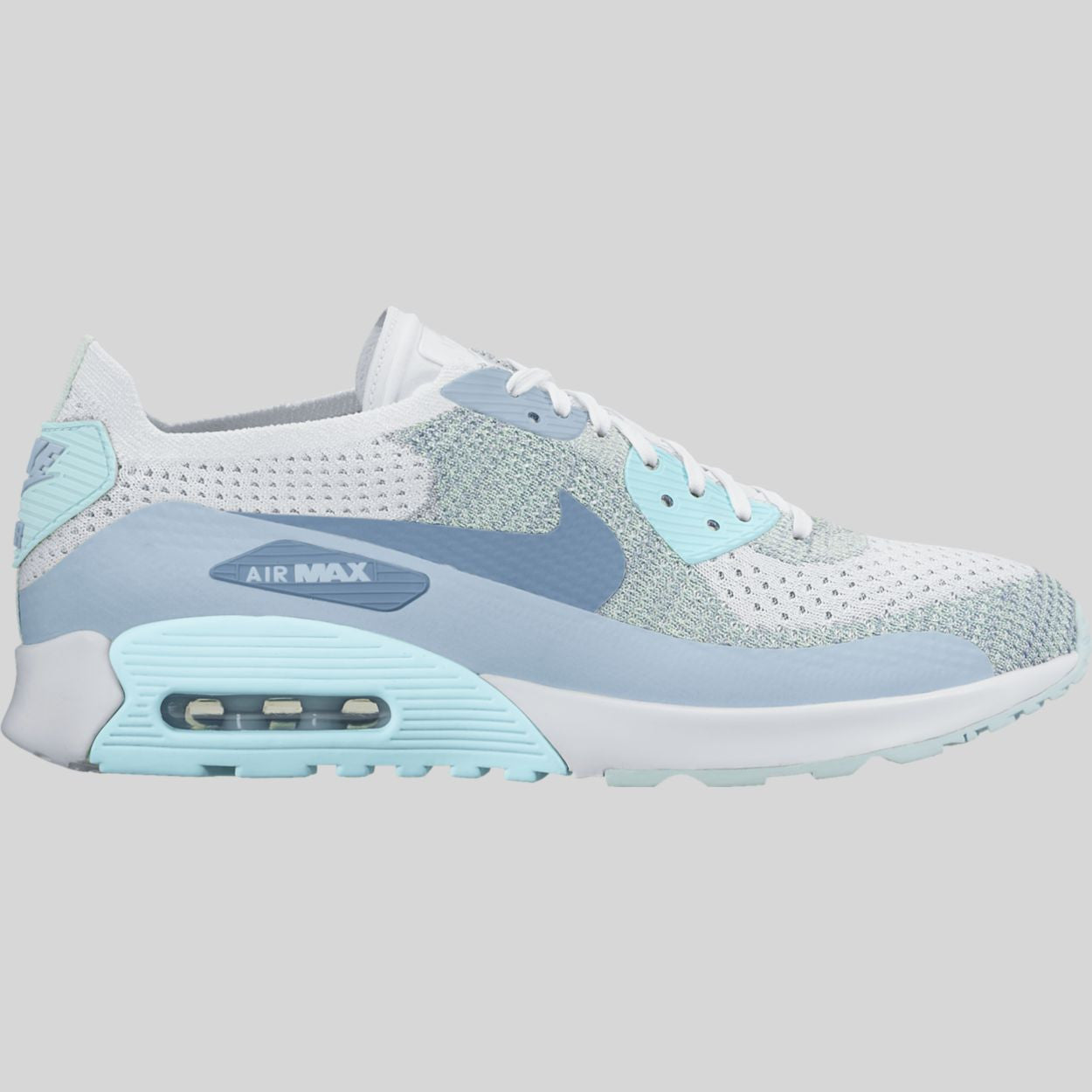 white and light blue nike air max