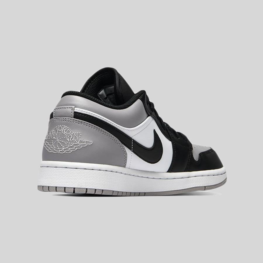 grey and black low jordan 1