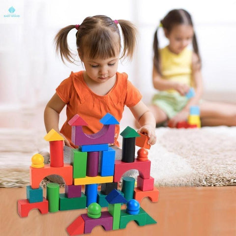 Girl playing with Wooden Block Building Set