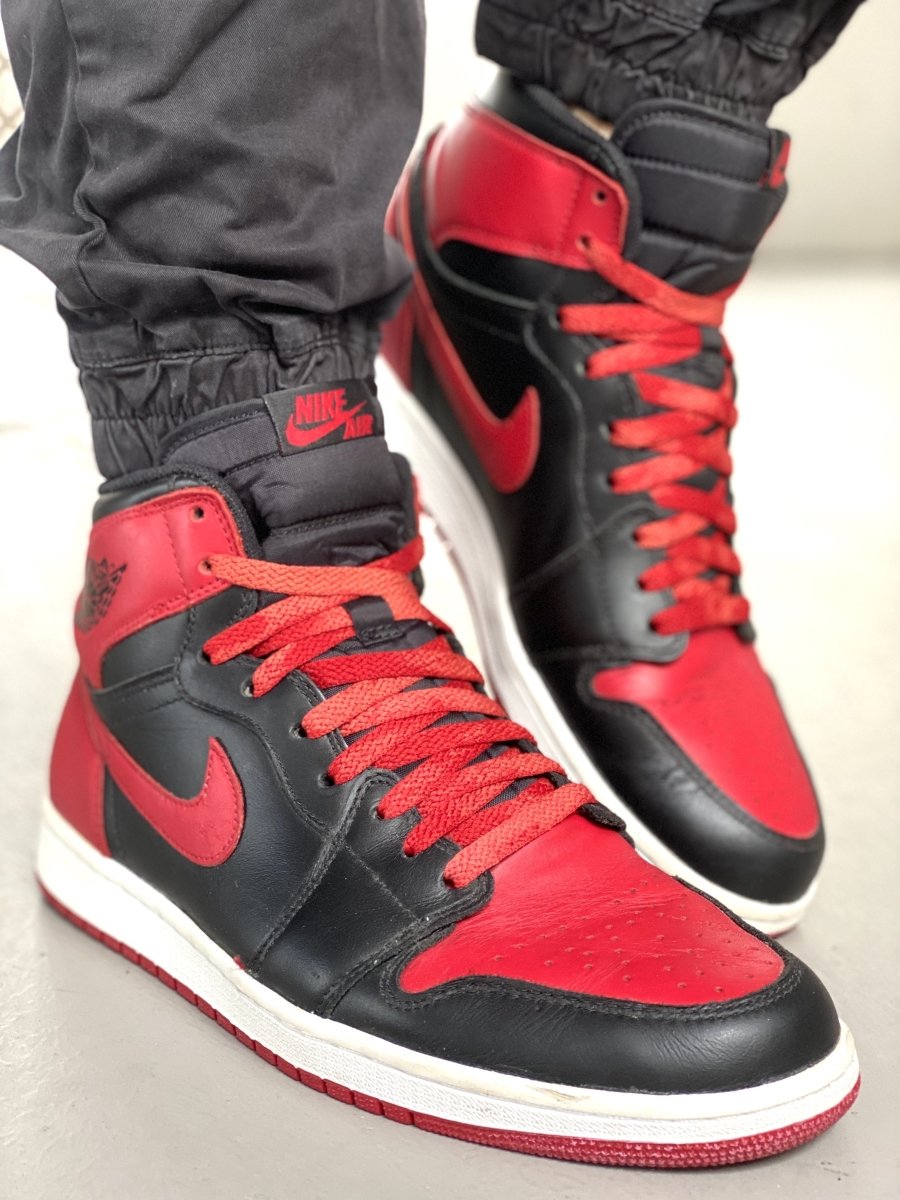 black jordan 1 with red laces