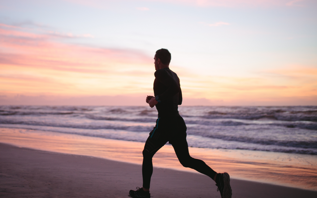 Man jogging on the beach