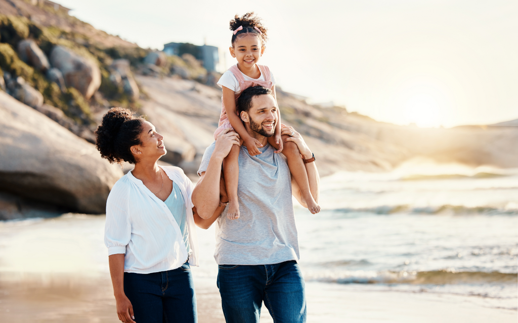 Family walking in the sunlight