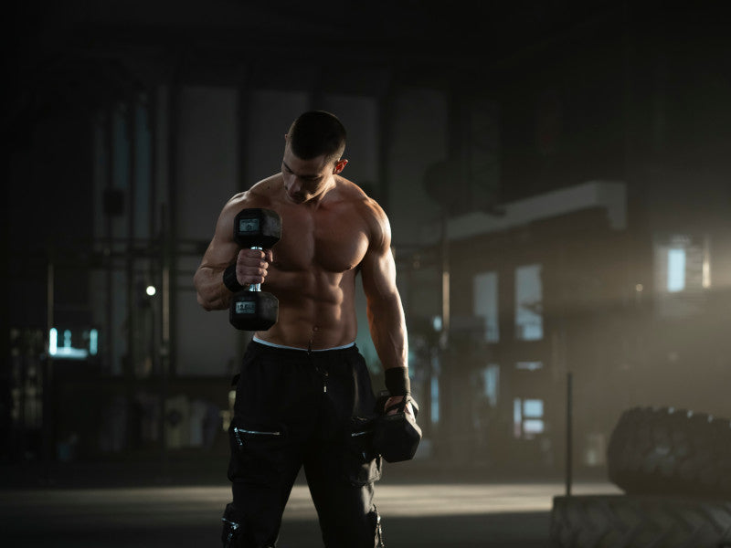 man lifting weights