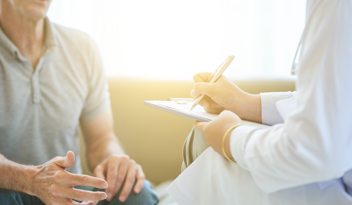 man talking to doctor