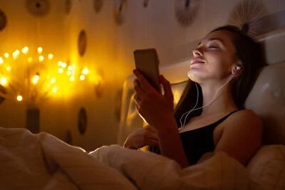 women relaxing to music