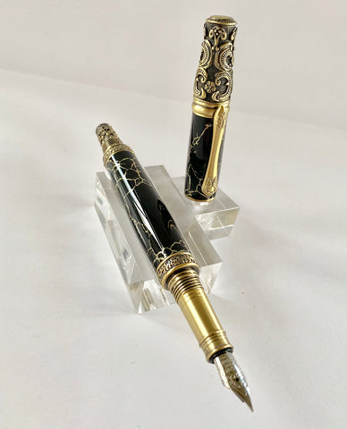 Image of finished Victorian fountain pen, black with gold threading