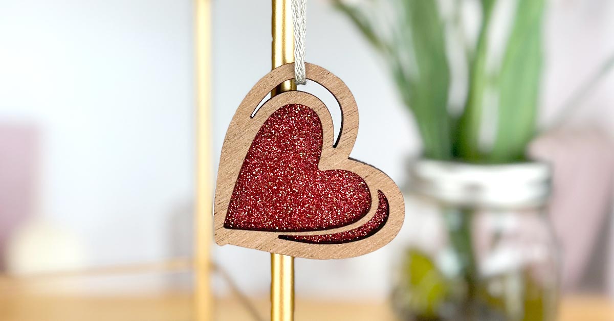 An 'I Love You' Red Heart ornament, perfect for Valentine's Day gifts for her. It's a charming Valentine's Day ornament to adorn a special Valentine's Day tree, capturing the spirit of the holiday.