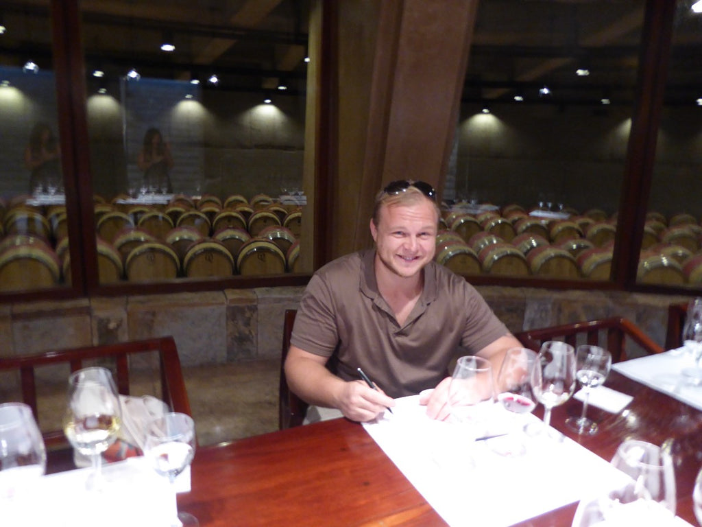 Fintan Kerr tasting Mendoza wine to fill the Wine Check