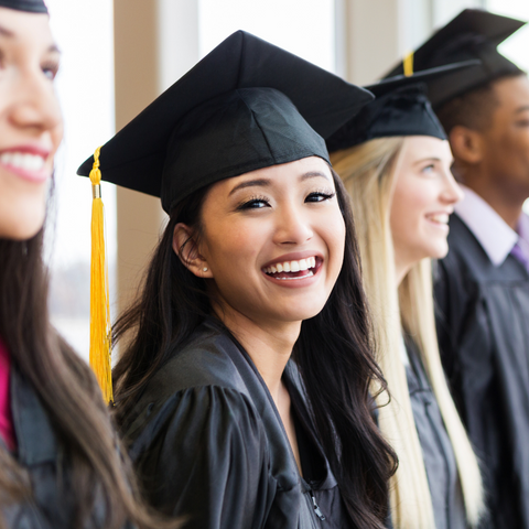 Graduation-cute-girl-smiling-in-gown