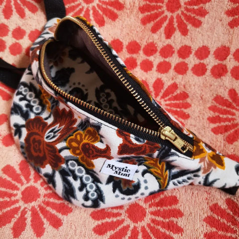 A floral patterned fanny pack created from recycled drapes by Mystic Mint