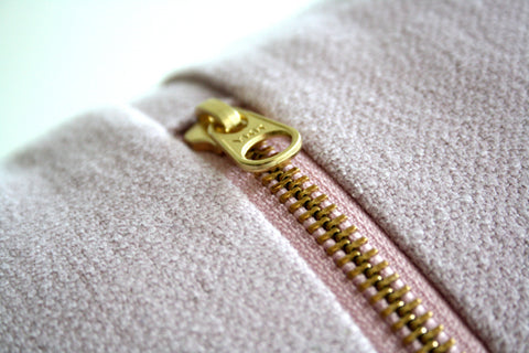 A close up of a zipper on a jacket