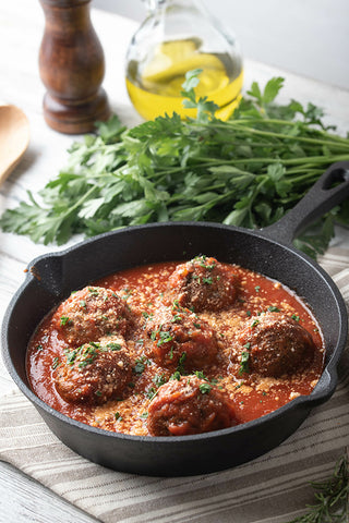 image of meatballs in a cast iron skillet