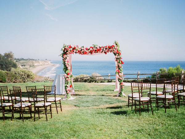 Gabrielle & Daniel - Wedding at The Ritz-Carlton Bacara, Santa Barbara | Waterfront Ceremony with Floral Wedding Canopy/Chuppah | Tallulah Ketubahs