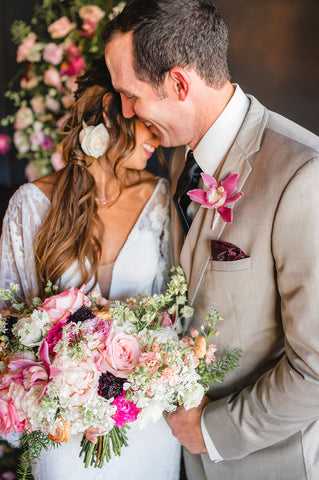 Barbiecore Wedding Inspiration wedding couple with pink bridal bouquet