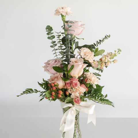 DIY Flower arrangement with pink flowers and greenery