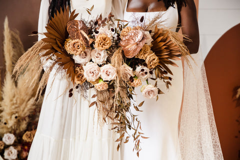 FiftyFlowers How To Style Toffee Roses and Possible Alternatives boho brides with large bridal bouquet containing toffee roses and toffee rose alternatives