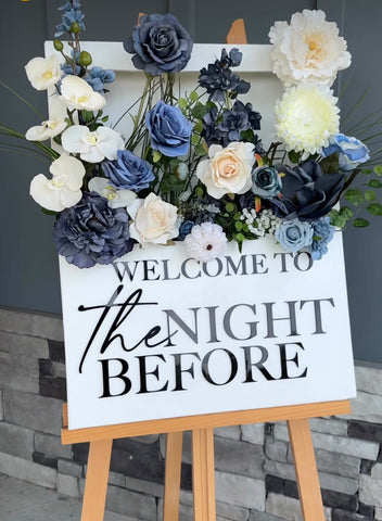 blue themed 3D flower sign with white sign and blue flowers coming out of it
