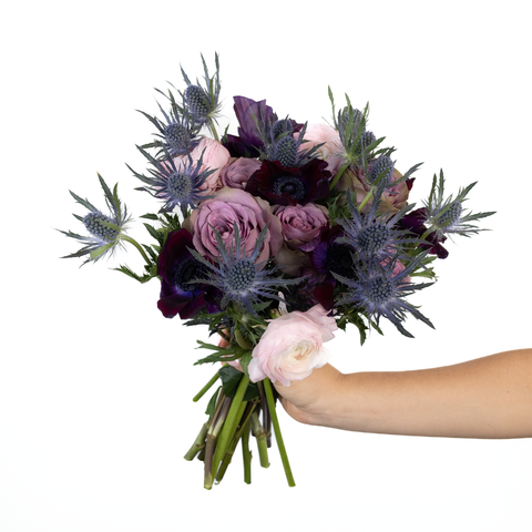 purple and dark purple flower bouquet with roses and anemones