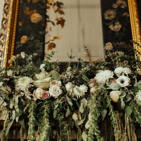 Master Winter Wedding Wreaths and Garlands full hanging garland on a fireplace
