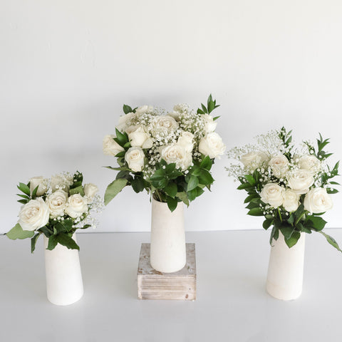 three vases with small, medium, and large centerpiece