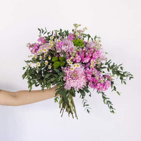 purple flower bouquet with greenery