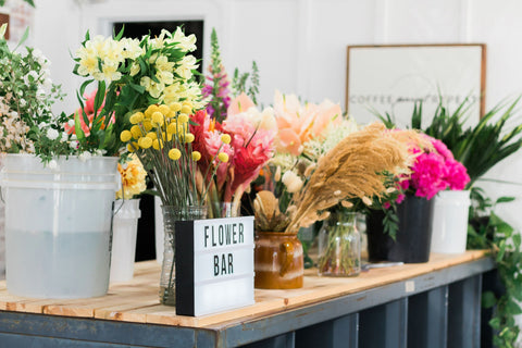 A Mother's Day bouquet bar created for a hands-on flowers experience at events