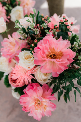 pink white and green bouquet up close