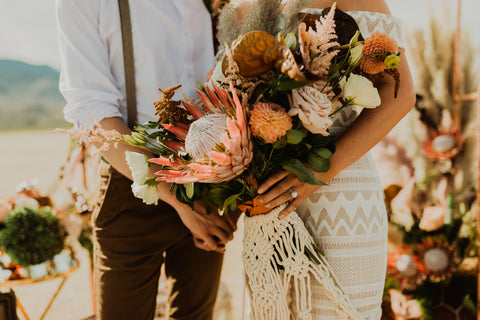 boho wedding bridal bouquet being held in hand