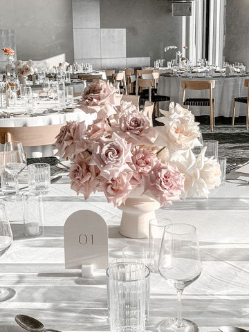 Blush and ivory roses centerpiece