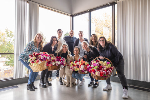 Preparing for Petal It Forward 2022 FiftyFlowers employees preparing for event