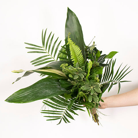 sword fern arranged in greenery bouquet