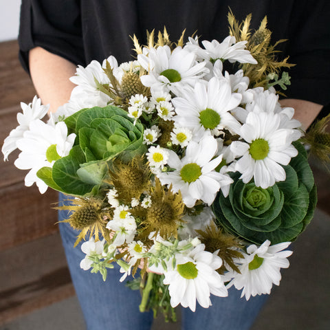 st.patricks day flower arrangement with white green and gold flowers