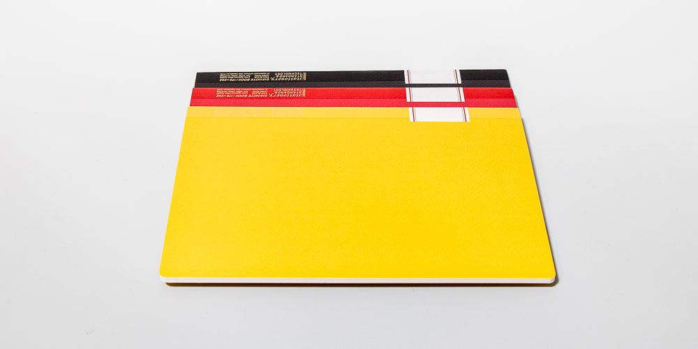 Notizbücher Vintage in Schwarz-Rot-Gelb