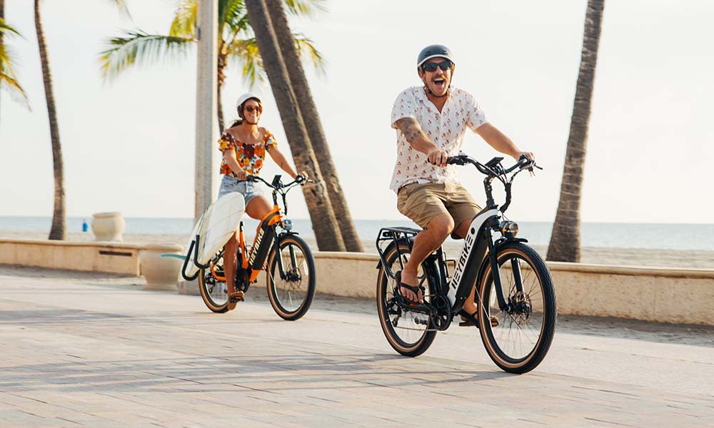 a man and girl are riding cityrun e-bikes