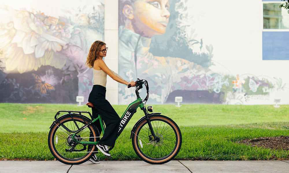 a girl is riding Cityrun cruiser ebike on the road