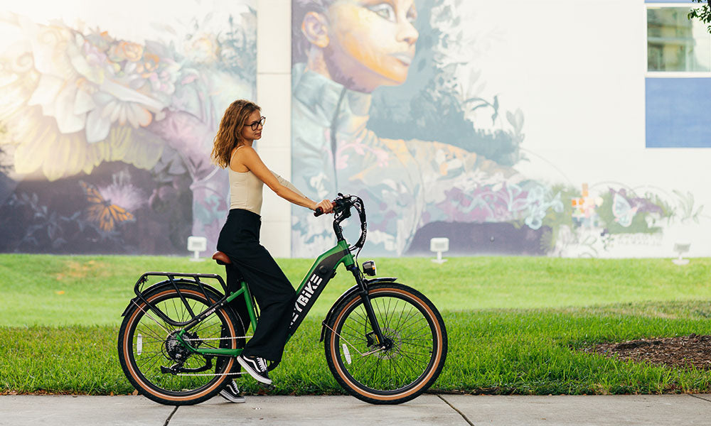 a girl is riding Cityrun ebike on the Earth Day