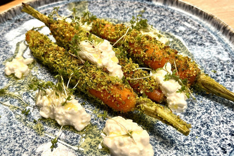 Sous vide carrots with pistachio bread crumble