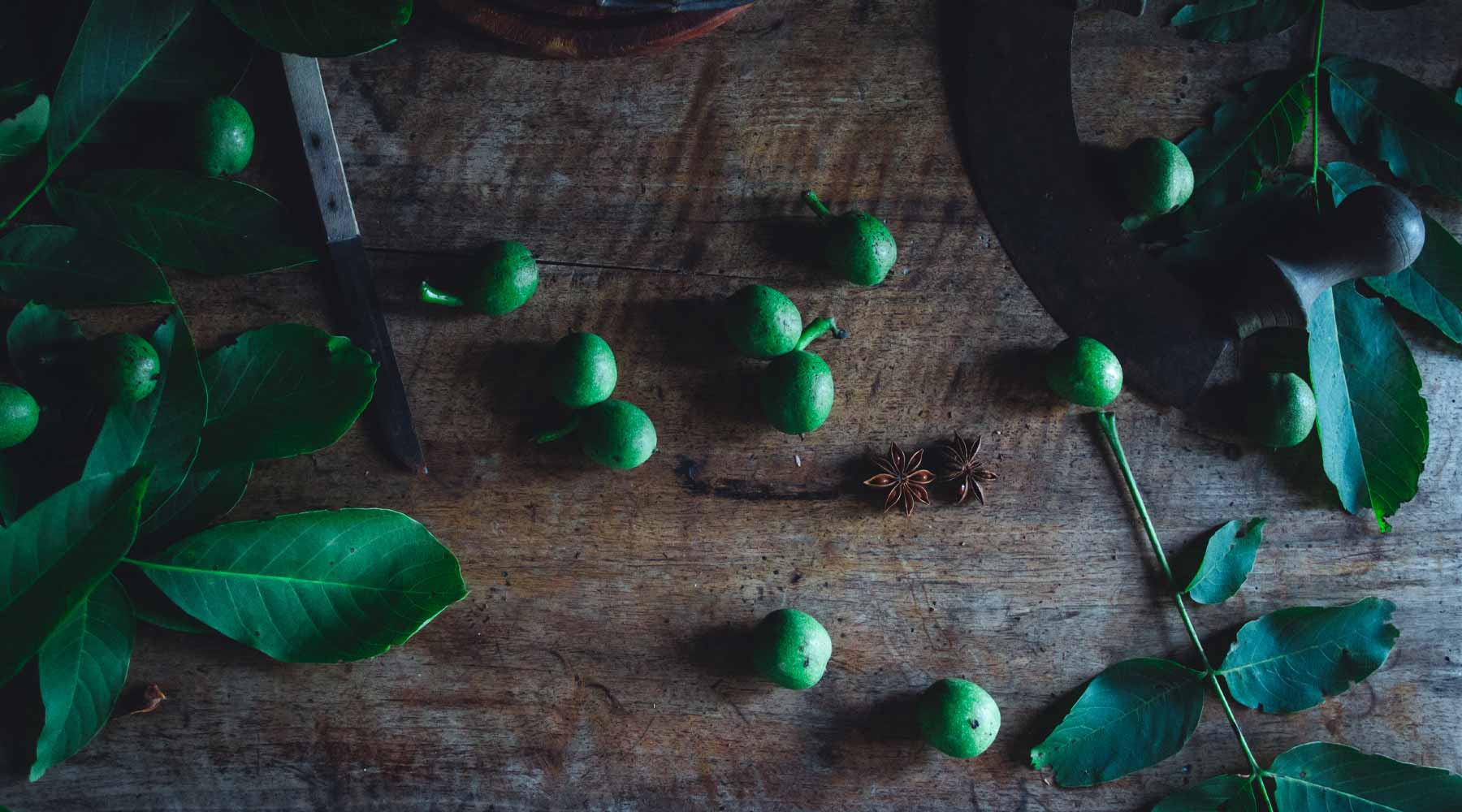 Green walnuts on the table