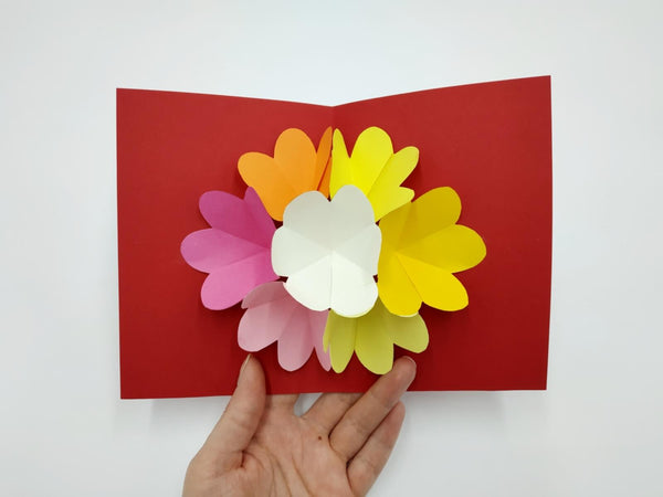 carte pop-up rouge, rose, orange et jaune