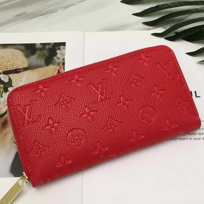 Louis Vuitton LV Women's Embossed Logo Long Zip Wallet