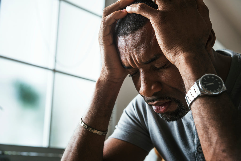 black man stressed mental health