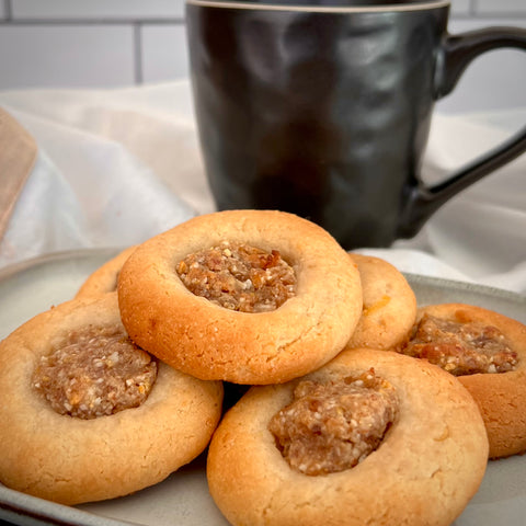 Almond thumbprint cookie. Tasty and savory sweet center round and soft cookie.