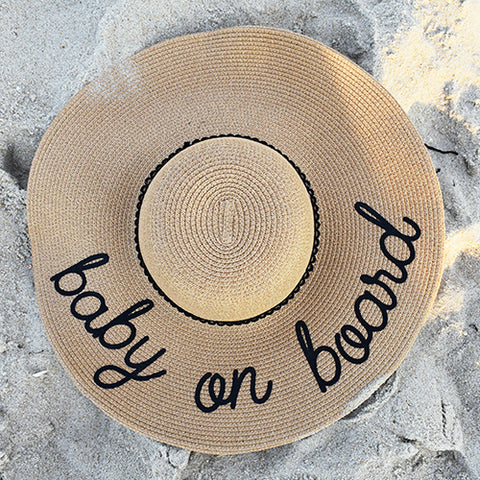 baby on board hat on sand