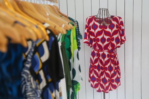 Groovy 70s print clothing hanging up