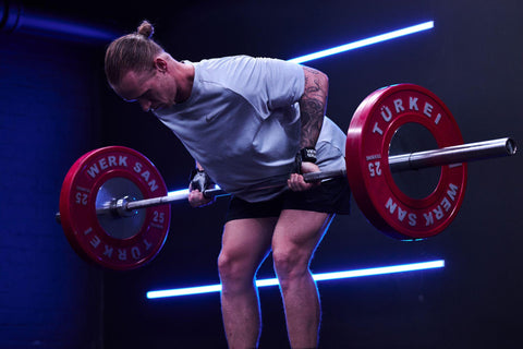 Man using Versa Gripps in his weightlifting workout