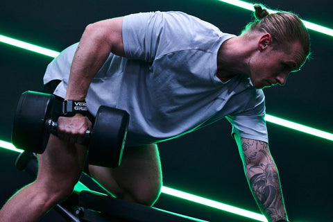 Weightlifter using Versa Gripps in the gym