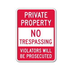 private property no trespassing sign in red and white