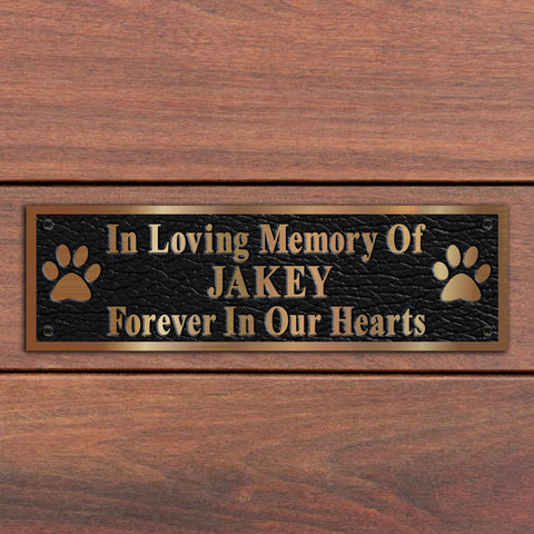 dog memorial plaque engraved with footprints